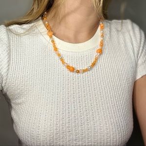 Orange and pearl beaded necklace